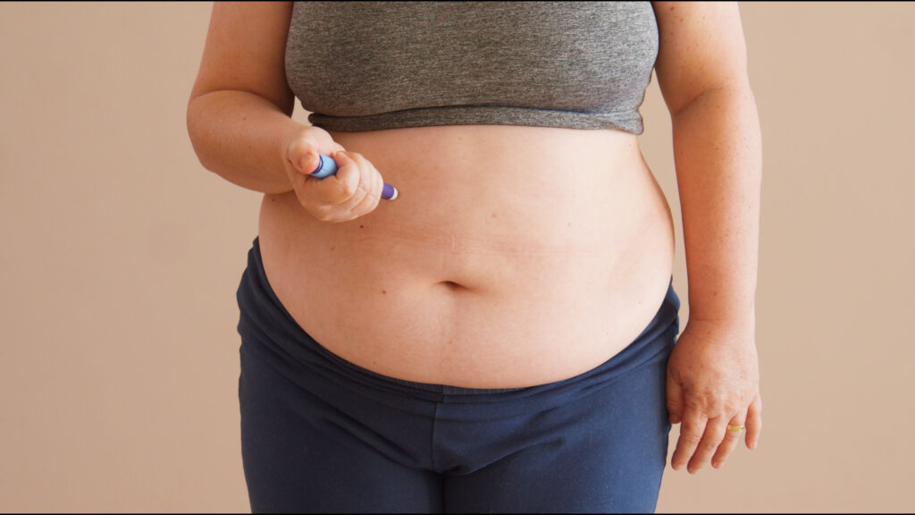 Person using Ozempic Semaglutide for Weight Loss | Discover the hidden risks that go along side using Ozempic Semaglutide.